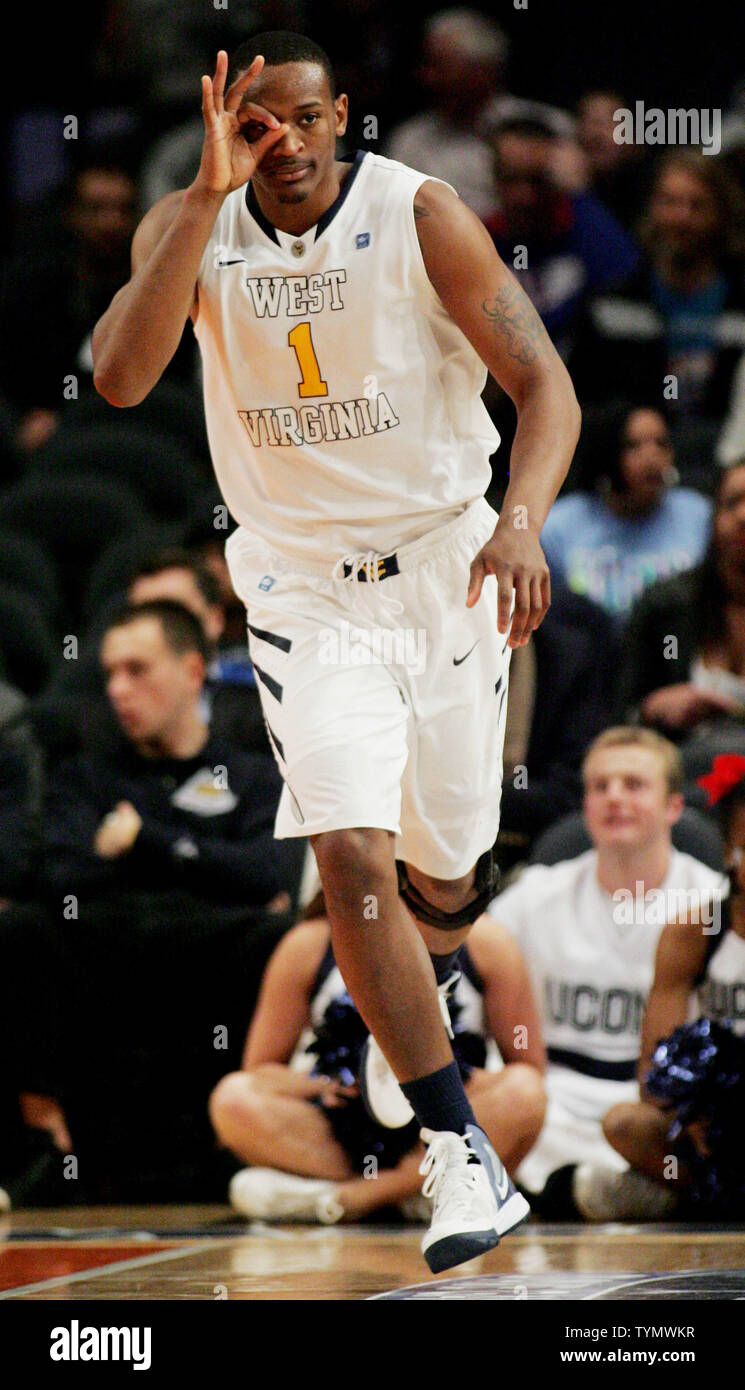 Dominique Rutledge Dominique Rutledge of West Virginia gestures after scoring against the ...