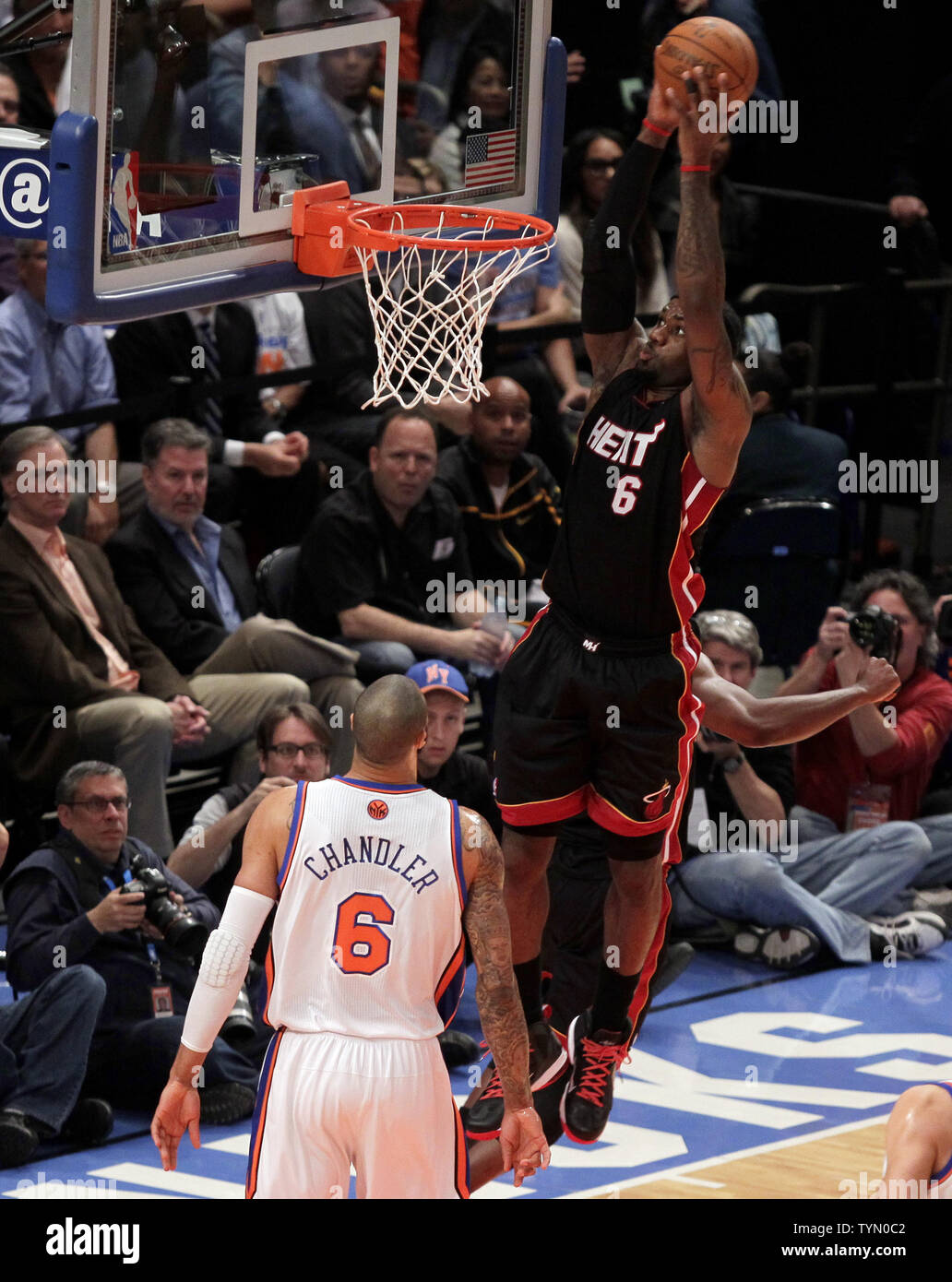 Free Beer & Hot Wings: LeBron James Stares Down Courtside Michael Jordan  During Dunk [Video]