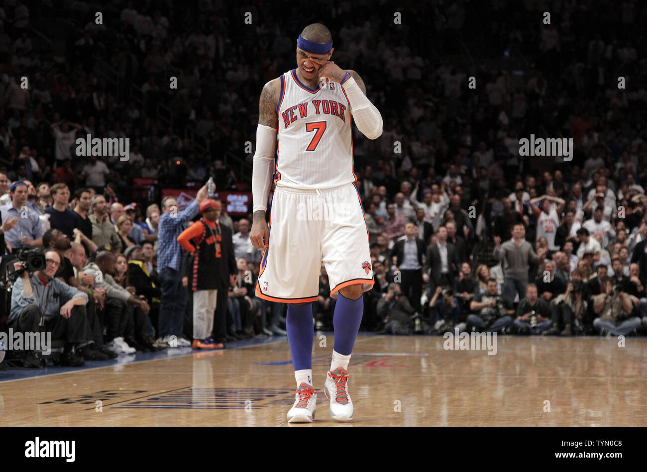 New York Knicks Carmelo Anthony rubs his eye in the fourth quarter
