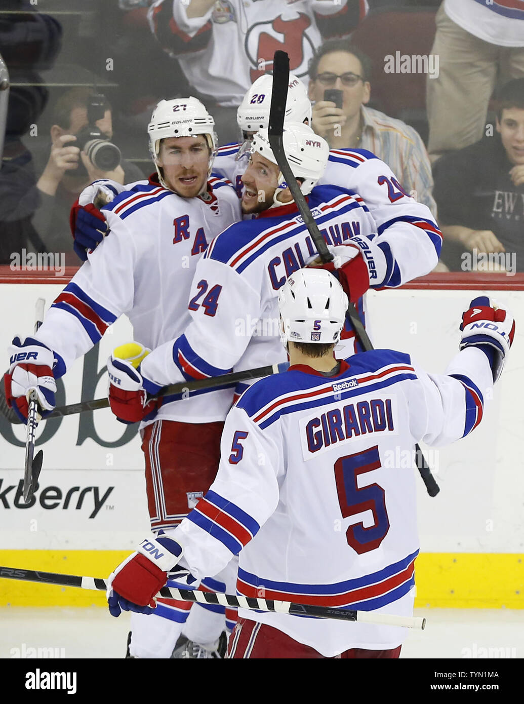 New York Rangers Chris Kreider reacts Ryan McDonagh, Ryan Callahan and Dan  Girardi after he scores a goal in the third period against the New Jersey  Devils in game 3 in the