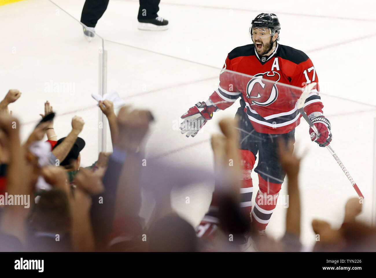 New Jersey Devils Ilya Kovalchuk reacts with the fans after scoring a goal  in the first Period against the New York Rangers in game 6 of the Eastern  Conference Finals of the