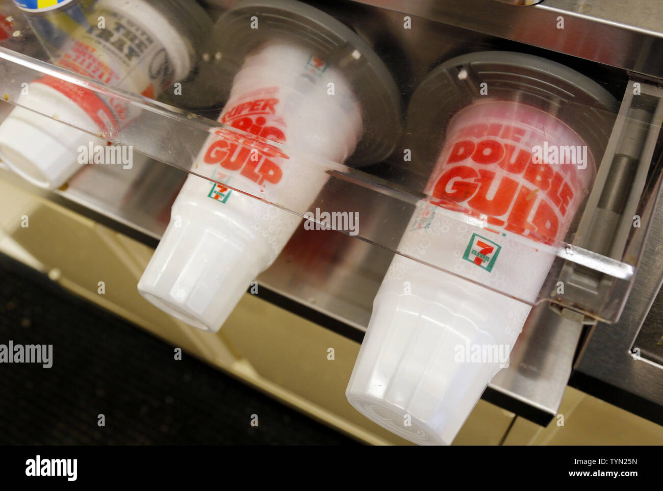 Big Gulp giant soda cups are arranged in size order in a store on the day  when New York City announces plans to ban the sale of large sodas and other  sugary