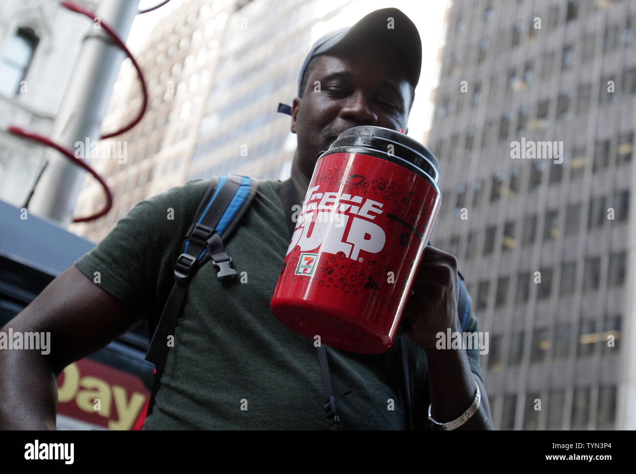 https://c8.alamy.com/comp/TYN3P4/protesters-hold-large-drinks-at-the-million-big-gulp-march-protest-organized-by-the-group-nyc-liberty-city-council-members-and-other-demonstrators-to-express-opposition-to-mayor-michael-r-bloombergs-proposal-to-prohibit-licensed-food-service-establishments-from-using-containers-larger-than-16-ounces-to-serve-high-calorie-drinks-at-city-hall-park-in-new-york-city-on-july-9-2012-the-proposed-first-in-the-nation-ban-would-impose-a-16-ounce-limit-on-the-size-of-sweetened-drinks-sold-at-restaurants-movie-theaters-sports-venues-and-street-carts-it-would-apply-to-bottled-drinks-as-well-as-f-TYN3P4.jpg