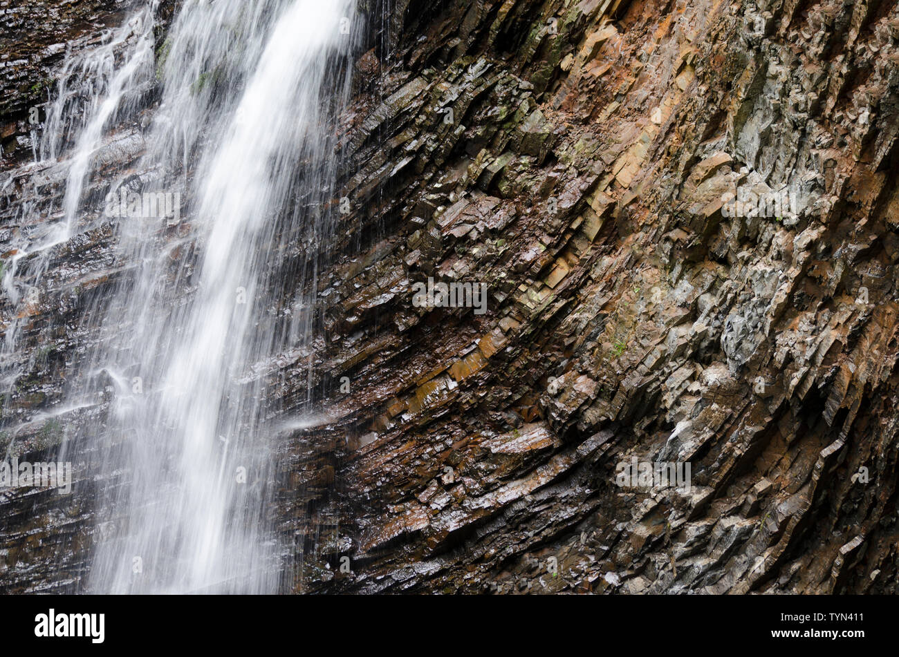 Waterfall of mountain river. Beautiful waterfall Stock Photo