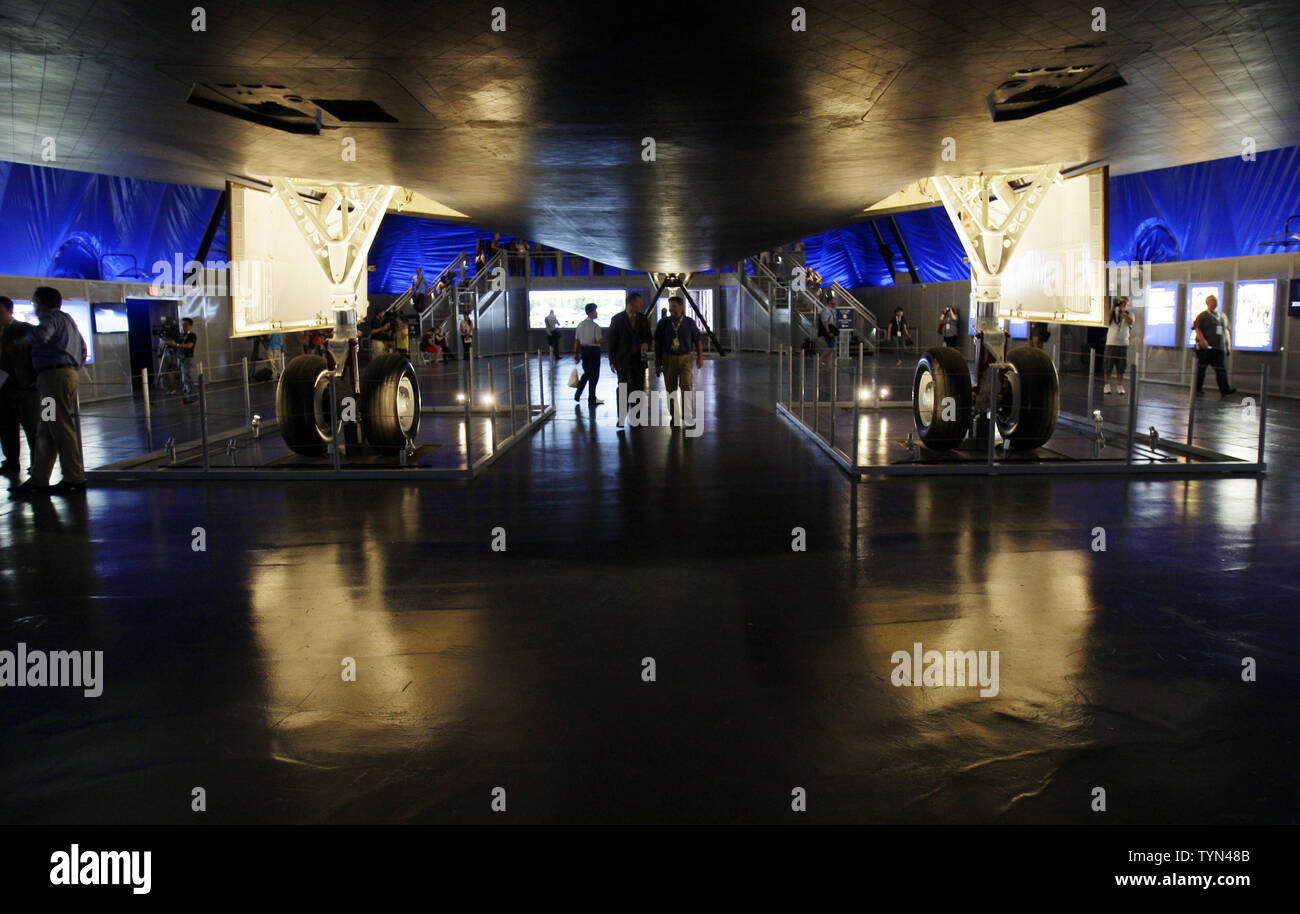 People Walk Underneath The Nasa Space Shuttle Enterprise As