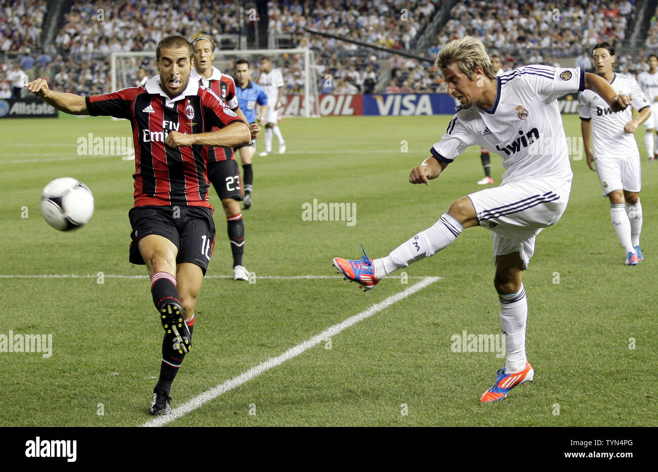 Real Madrid Fabio Coentrao takes a shot at the goal in the first half against A.C. Milan at the Herbalife World Football Match Challenge 2012 at Yankee Stadium in New York City on August 8, 2012. Real Madrid defeated A.C. Milan 5-1.     UPI/John Angelillo Stock Photo
