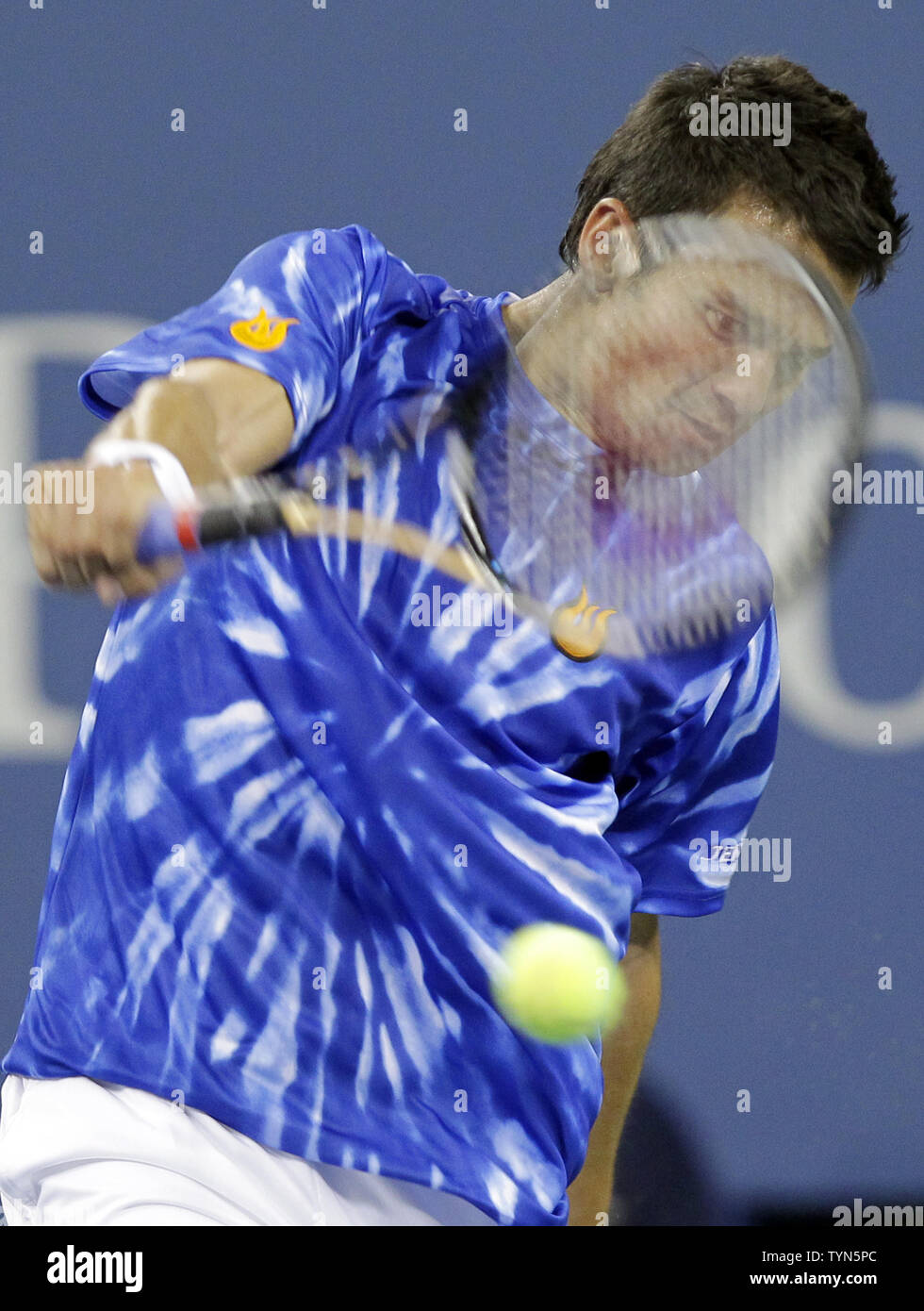 Bjorn Phau of Germany hits a backhand to Roger Federer of Switzerland in their second round match at the 2012 U.S. Open Tennis Championships in Arthur Ashe Stadium at the Billie Jean King National Tennis Center in New York City on August 30, 2012.      UPI/John Angelillo Stock Photo