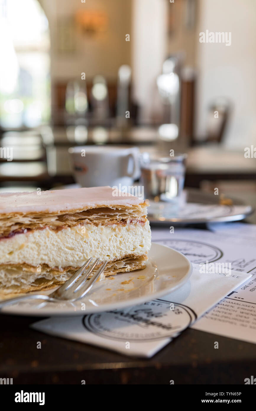 traditional Austrian creamy, flaky pastry dessert served on a table in