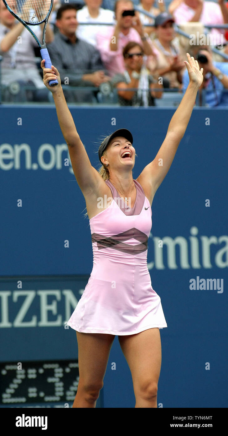Maria Sharapova, Russia, celebrates after defeating Marion Bartoli, France,  during their quarterfinal match at the 2012