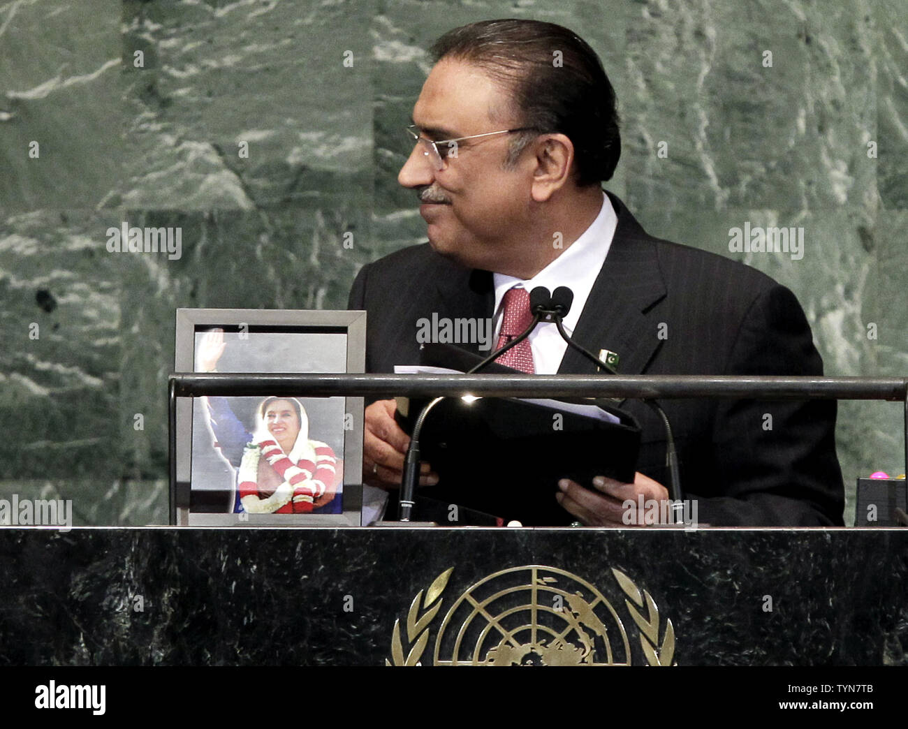 His Excellency Asif Ali Zardari, President of the Islamic Republic of Pakistan addresses the United Nations with a photo of the late Prime Minister Benazir Bhutto to his right at the 67th United Nations General Assembly in the UN building in New York City on September 25, 2012. Bhutto, who was assassinated in 2007.    UPI/John Angelillo Stock Photo