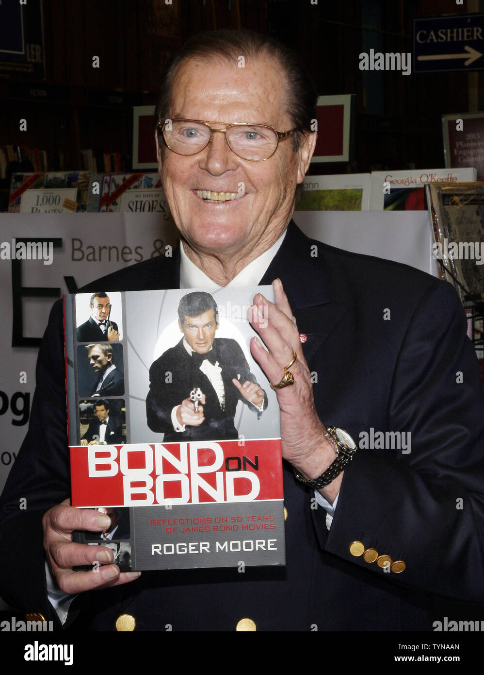 Sir Roger Moore Arrives To Sign Copies Of His Book Bond On Bond