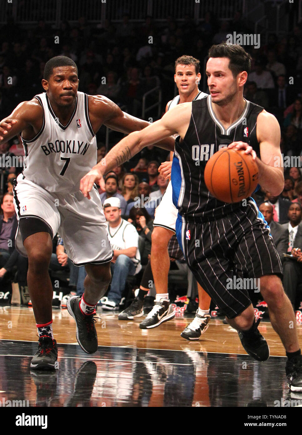 Orlando Magic guard J.J. Redick (7) drives to the basket against Brooklyn Nets guard Joe Johnson (7) during the first half at the Barclays Center in New York City on November 11, 2012.       UPI/Nicole Sweet Stock Photo