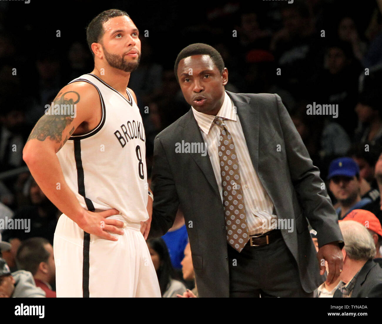Brooklyn Nets guard Deron Williams (8) talks with Brooklyn Nets head coach Avery Johnson during the first half against Orlando Magic at the Barclays Center in New York City on November 11, 2012.       UPI/Nicole Sweet Stock Photo