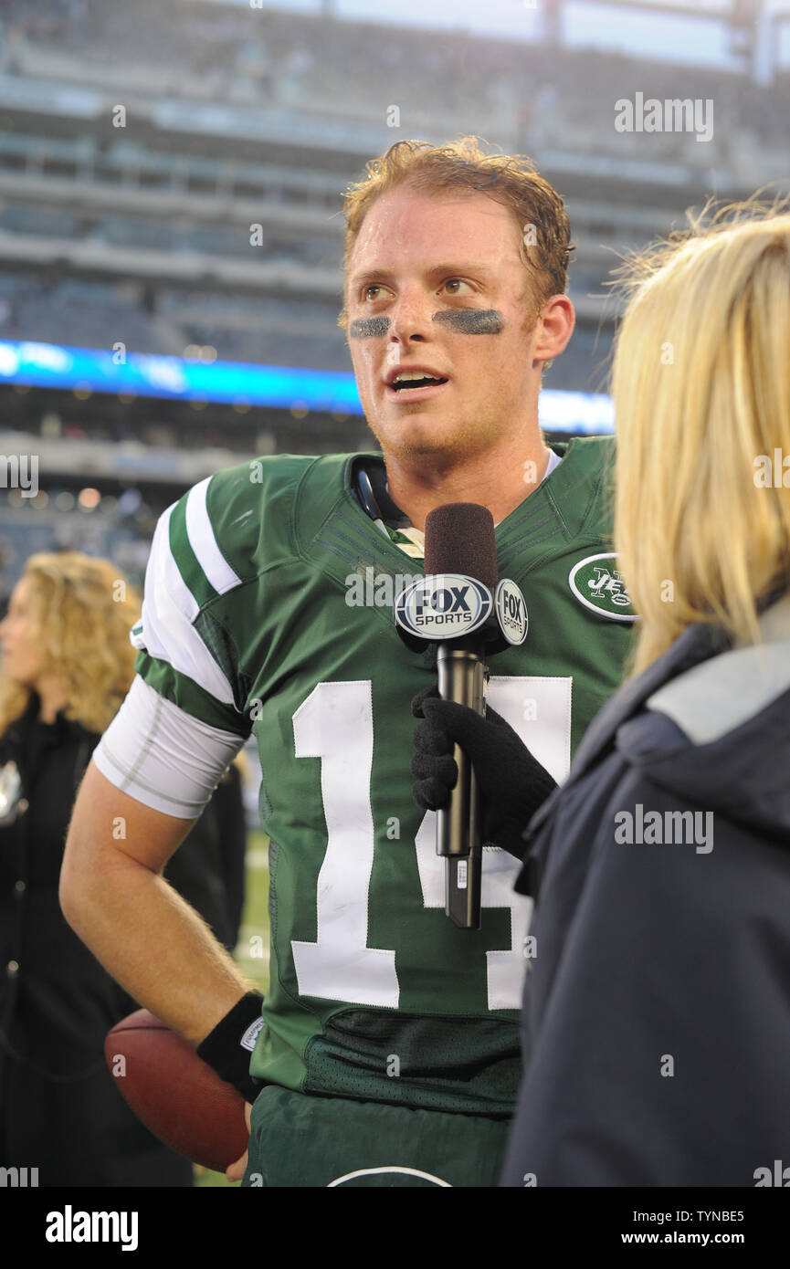 New York Jets quarterback Greg McElroy (14) is interviewed after