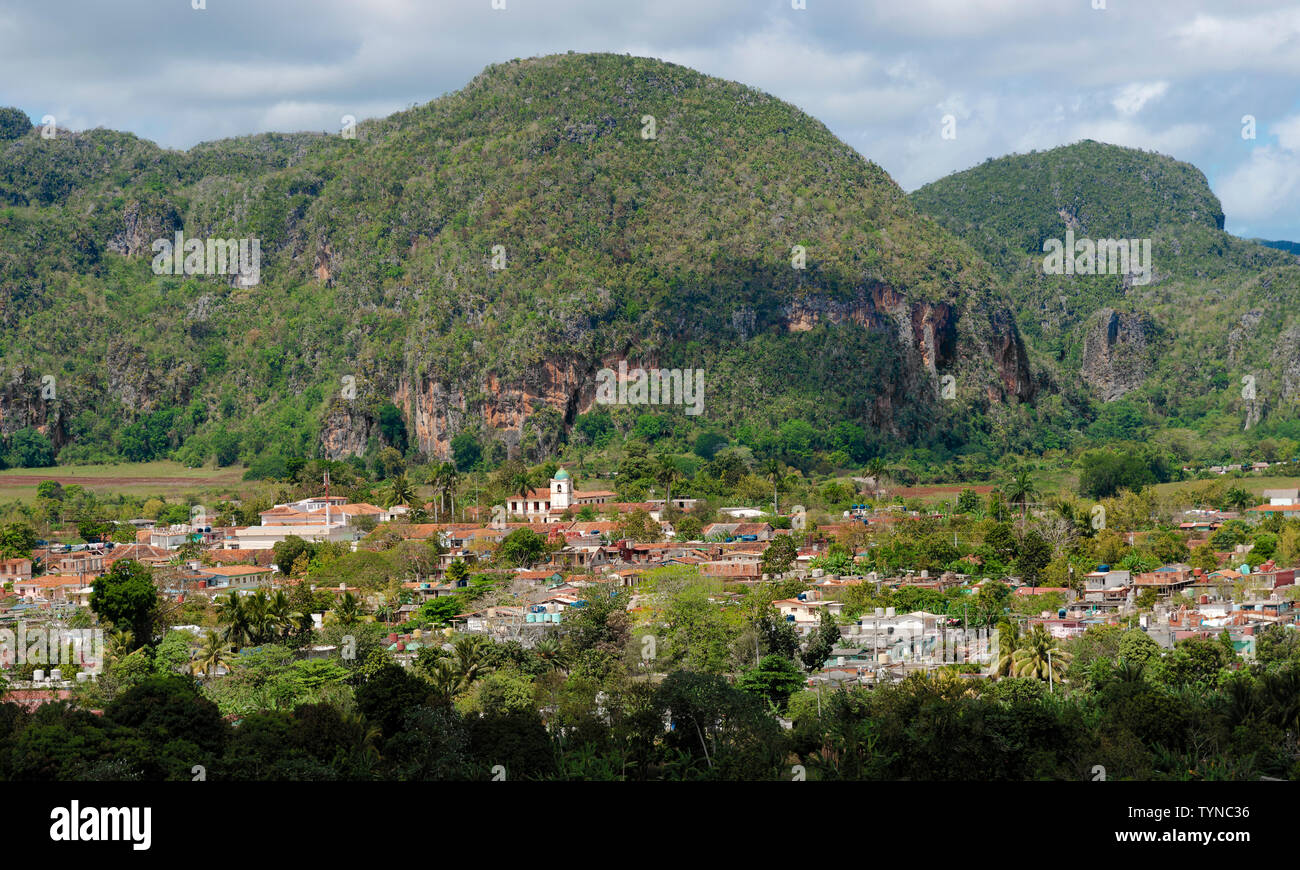 Elevated view of the town of Vinales with mogotes behind in the Vinales Valley, Pinar Del Rio Province, Cuba, Caribbean Stock Photo