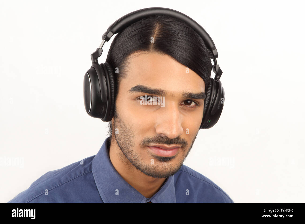pics Guy With Headphones Stock Photo https www alamy com indian man listening to music with headphones image258011740 html