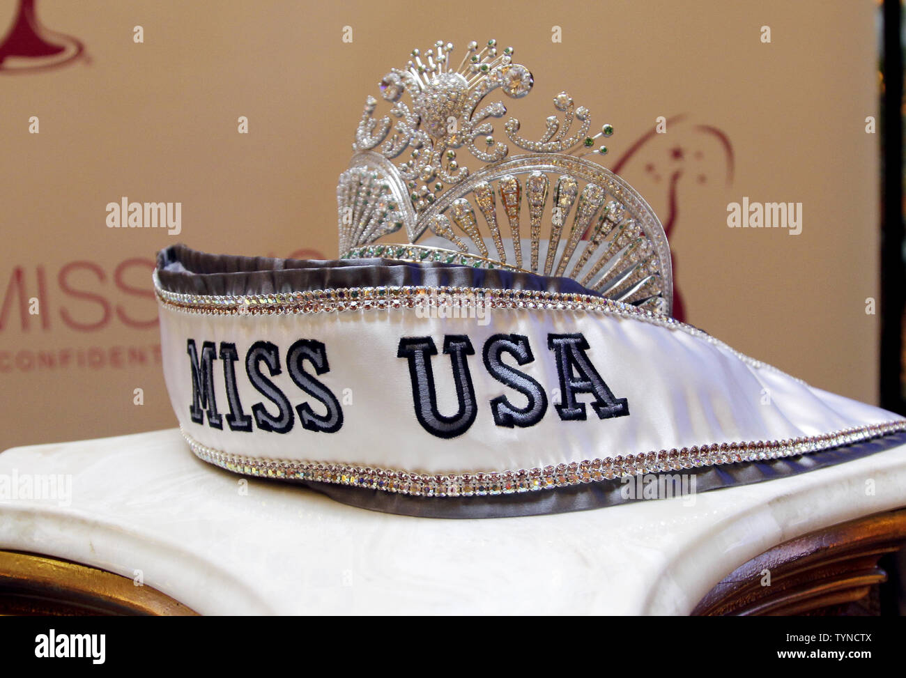 The Miss USA crown and sash are set on the stage for the crowning ceremony  of the new Miss USA at Trump Tower in New York City on January 9, 2013. Nana