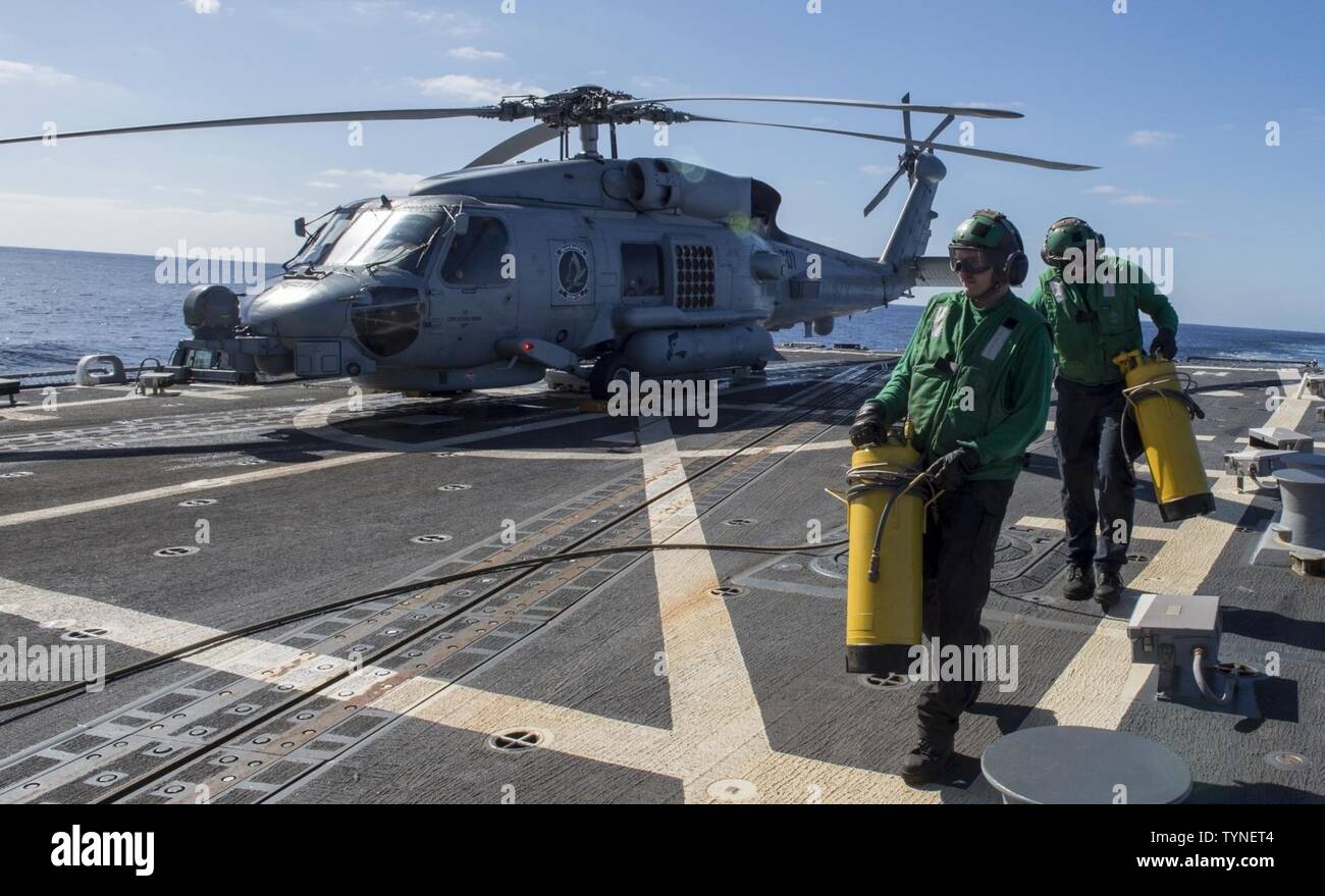 OCEAN (Nov. 18, 2016) Petty Officer 3rd Class Bobby Davis (left) and ...