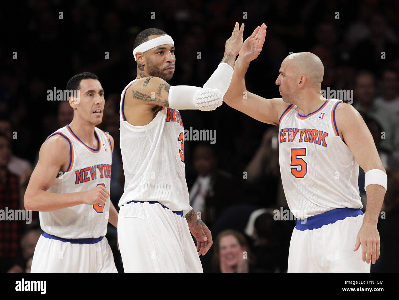 New York Knicks Kenyon Martin reacts with Jason Kidd and Pablo