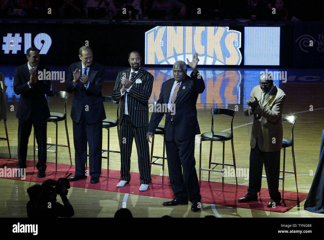 Former New York Knicks player Willis Reed reacts when he is introduced with the rest of the Knicks 1973 championship team at half time of the game against the Milwaukee Bucks at Madison Square Garden in New York City on April 5, 2013.   UPI/John Angelillo Stock Photo