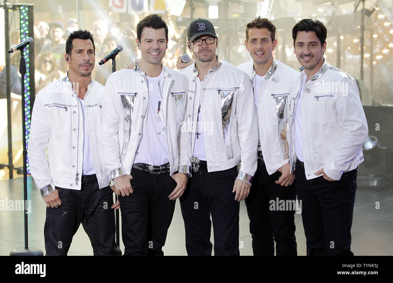 New Kids On The Block band members Danny Wood, Jordan Knight, Donnie Wahlberg, Joey Mcintyre and Jonathan Knight  perform with 98 Degrees & Boyz II Men on the NBC Today Show at Rockefeller Center in New York City on May 31, 2013.       UPI/John Angelillo Stock Photo