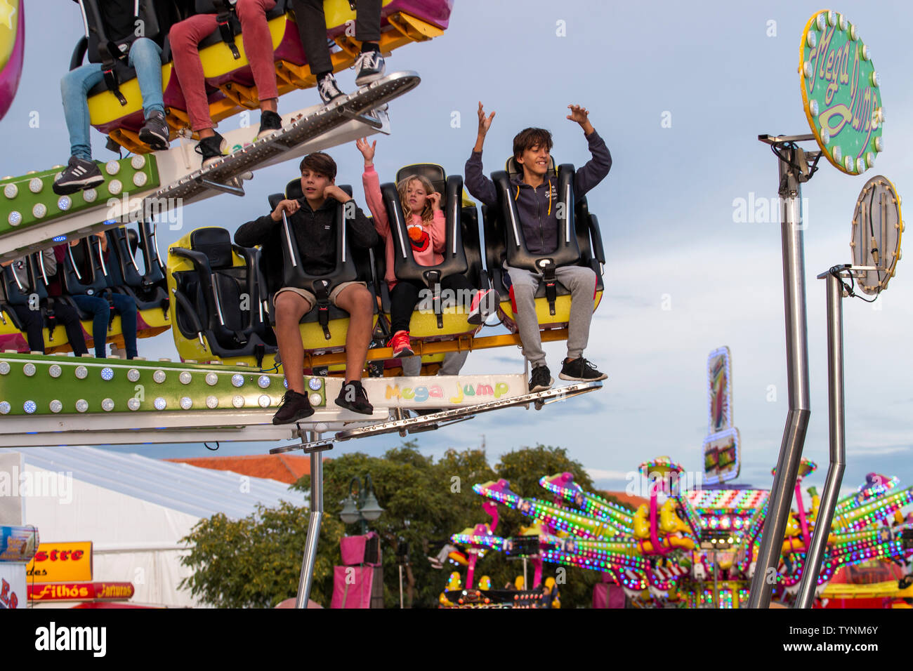 FARO, PORTUGAL - OCTOBER 2018: Fun fair event Santa Iria with games ...
