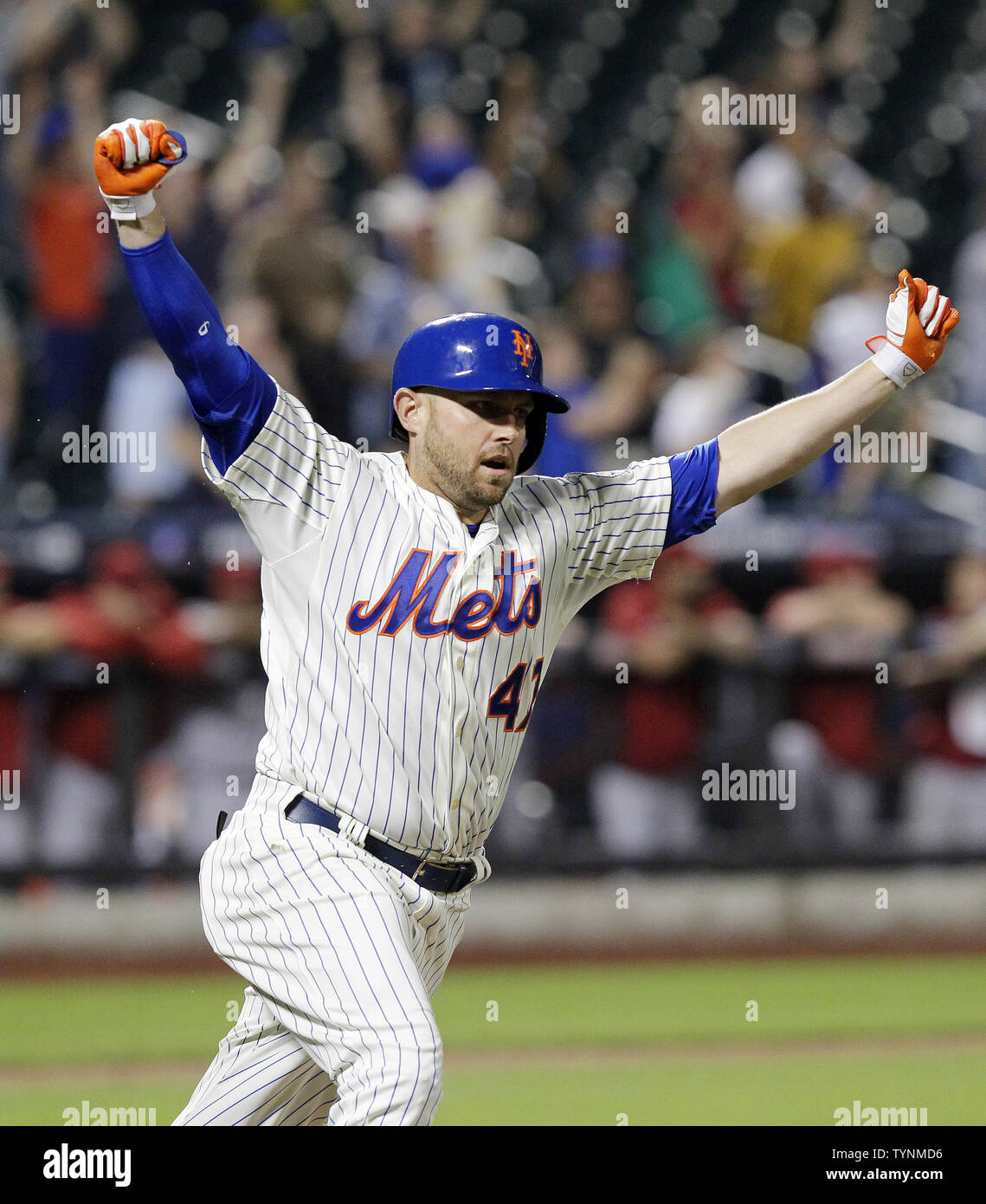 New York Mets Andrew Brown reacts after driving in the game winning runs  with a single in the 13th inning against the Arizona Diamondbacks at Citi  Field in New York City on