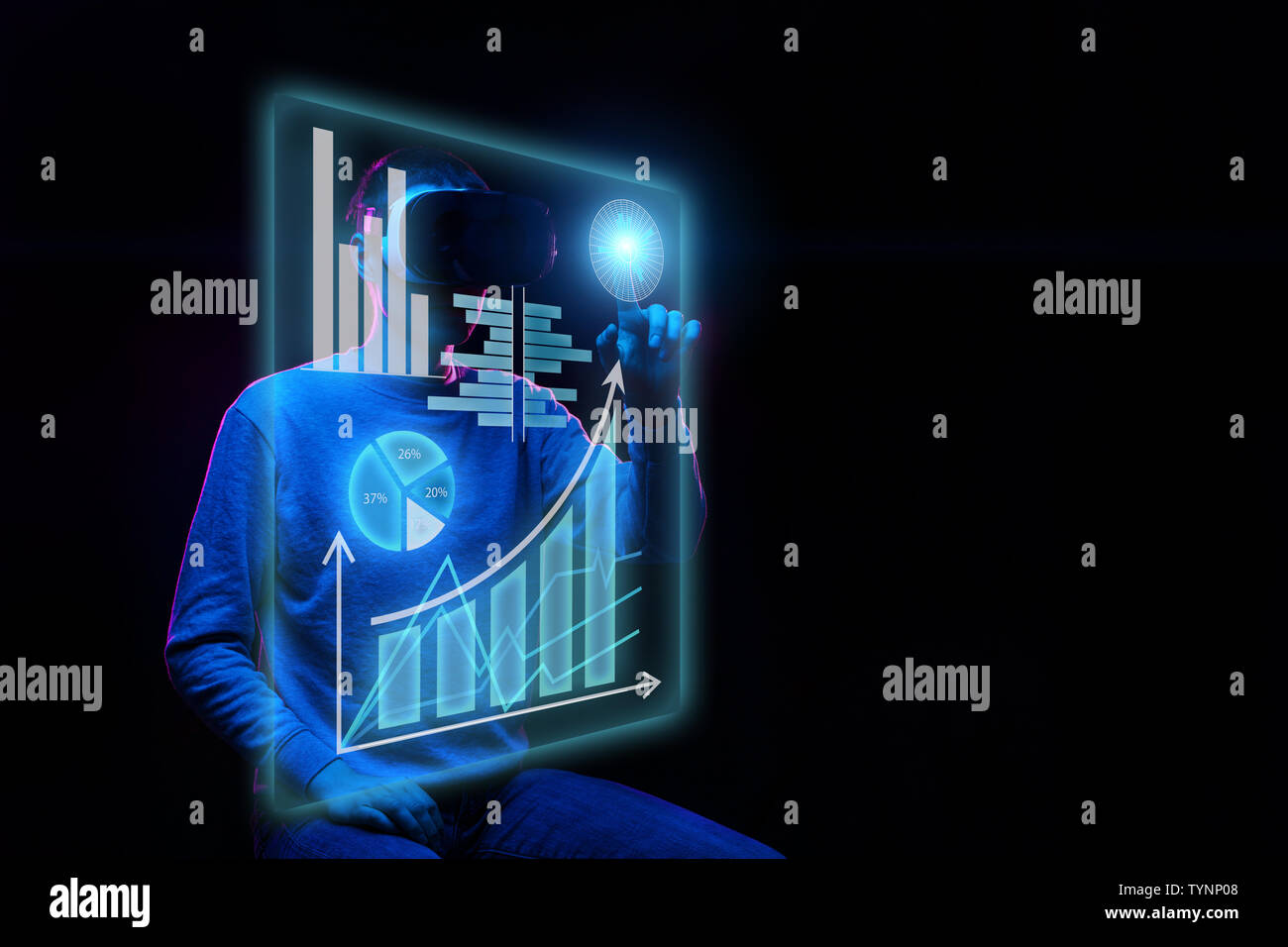 Man uses a virtual reality headset to work with data in the form of ...