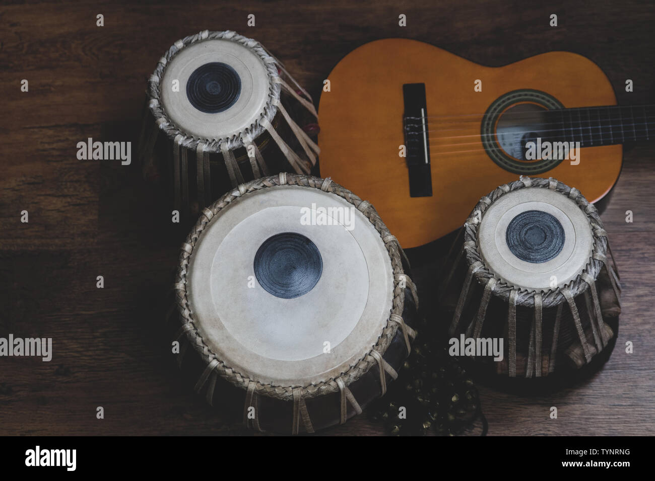 Acoustic guitar, cajon and tabla view of the musical instruments used