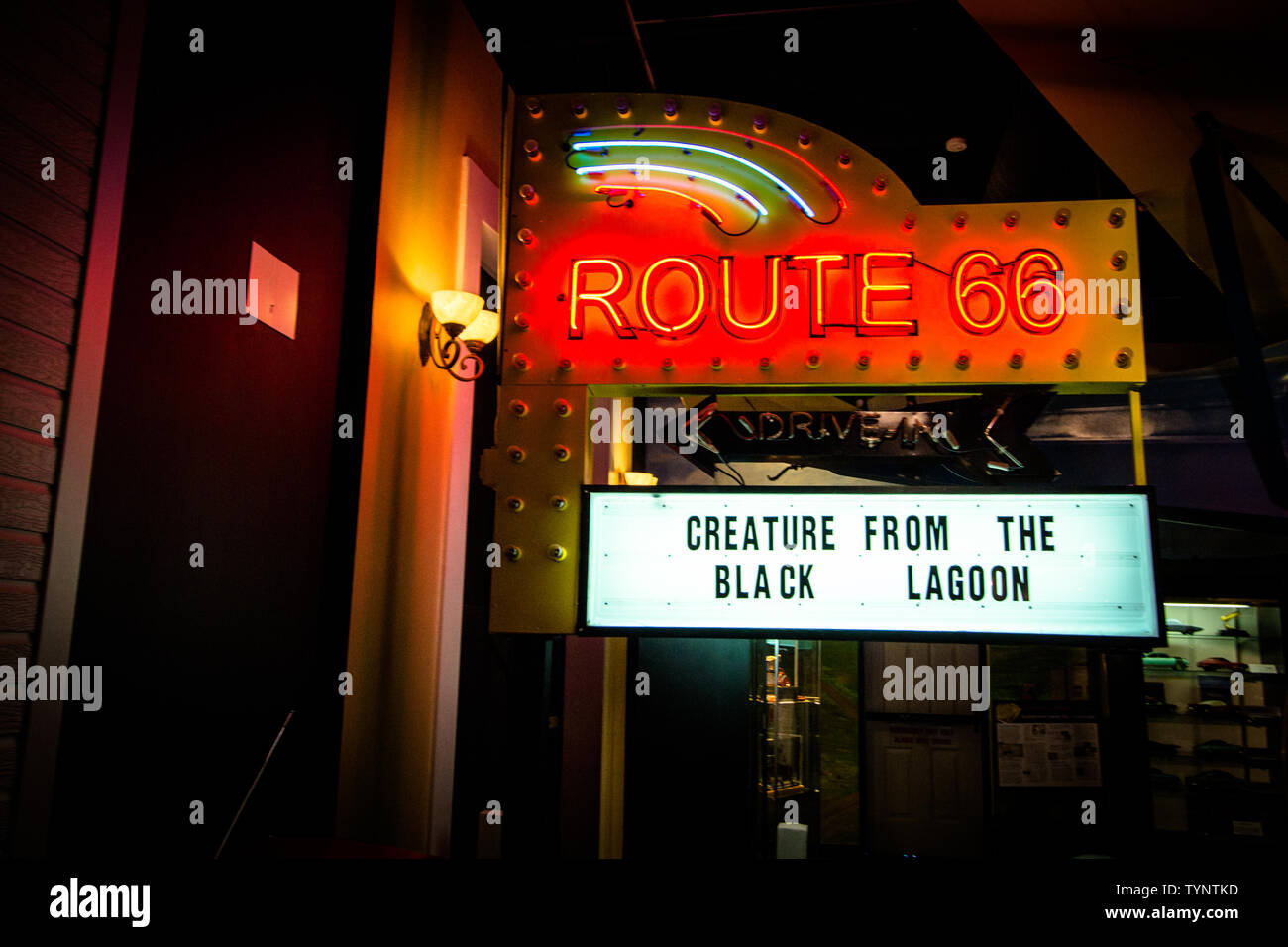 Elk City, Oklahoma, USA - April 27, 2019: Retro neon sign of a Route 66 drive in at the Historic Route 66 Museum in Oklahoma. Stock Photo