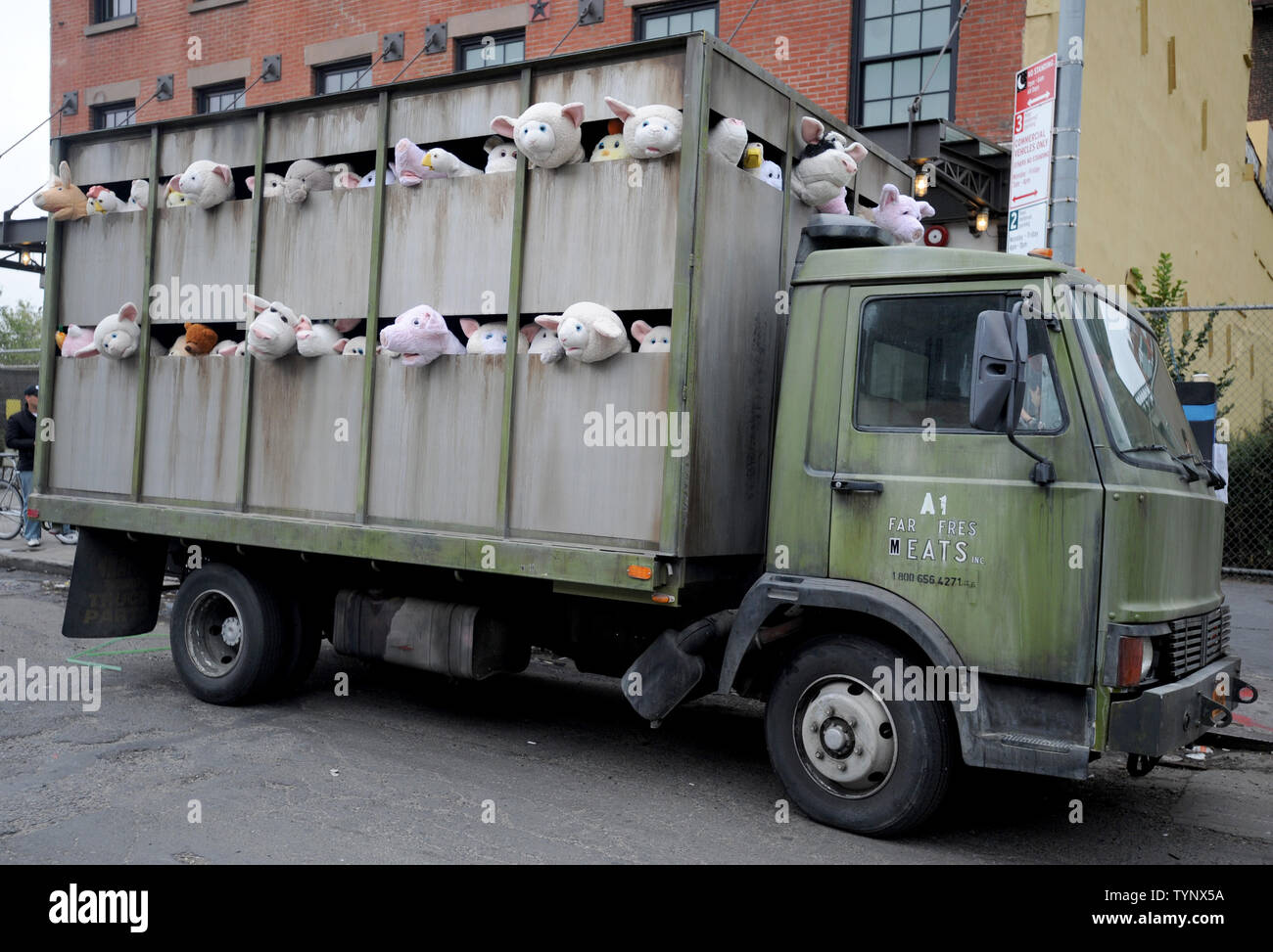 The 'Sirens of the Lambs' art installation created by British street artist Banksy is seen in New York City on October 14, 2013. Banksy is a pseudonymous England-based graffiti artist, political activist, film director, and painter. His satirical street art and subversive epigrams combine dark humor with graffiti done in a distinctive stenciling technique.    UPI/Dennis Van Tine Stock Photo