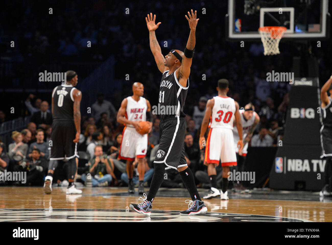 Brooklyn Nets shooting guard Jason Terry (31) reacts with fans during the first quarter against the Miami Heat at Barclays Center in New York City on November 1, 2013.   UPI/Rich Kane Stock Photo