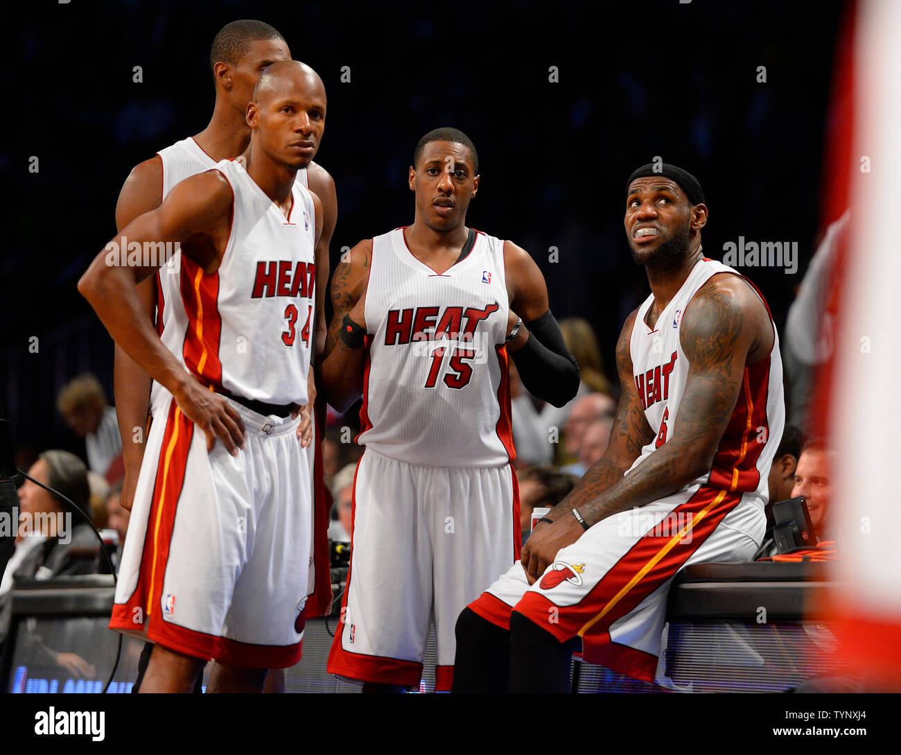 Miami Heat shooting guard Ray Allen (34), Heat point guard Mario Chalmers (15) and Heat small forward LeBron James (6) look on during a timeout in the fourth quarter against the Brooklyn Nets at Barclays Center in New York City on November 1, 2013.   UPI/Rich Kane Stock Photo