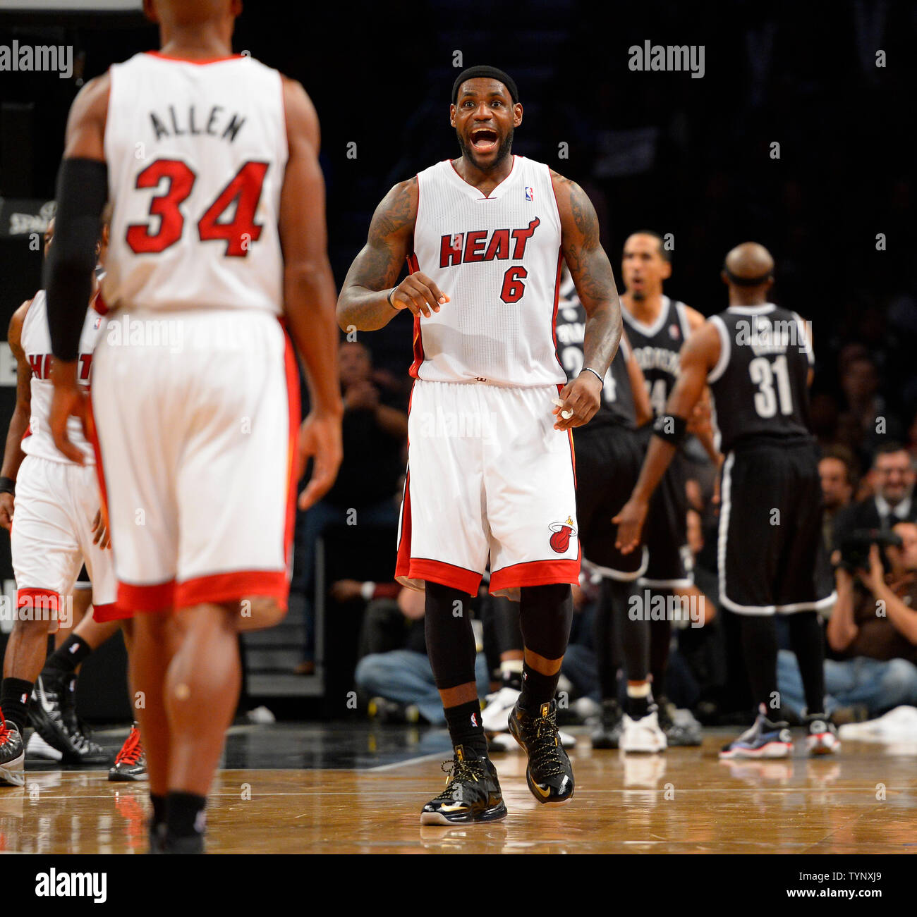 Miami Heat small forward LeBron James (6) looks back at Heat shooting guard Ray Allen (34) in the fourth quarter against the Brooklyn Nets at Barclays Center in New York City on November 1, 2013.   UPI/Rich Kane Stock Photo