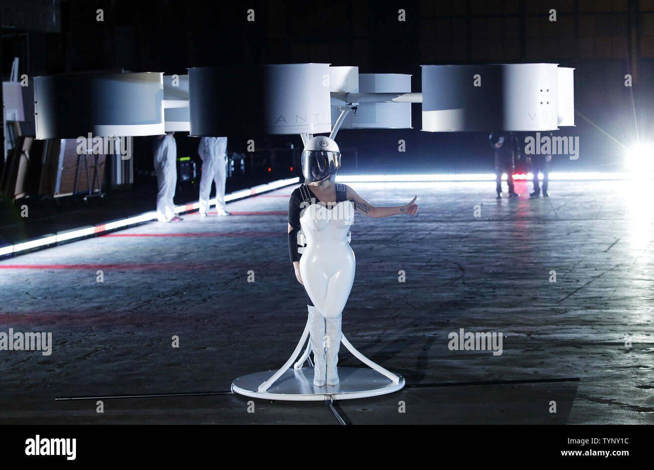 Lady Gaga demonstrates Volantis, the worlds first flying dress, at a press conference at Brooklyn Navy Yard in New York City on November 10, 2013. UPI/John Angelillo Stock Photo - Alamy Lady Gaga demonstrates Volantis, the worlds first flying dress, at a press conference at Brooklyn Navy Yard in New York City on November 10, 2013. UPI/John Angelillo Stock Photo - Alamy