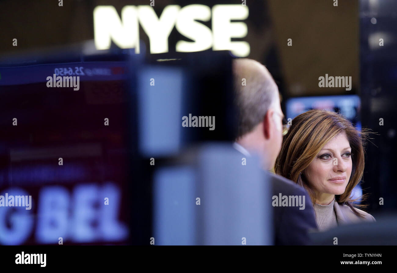 Maria Bartiromo does her CNBC broadcast from the floor of the NYSE before the closing bell on Wall Street In New York City on November 19, 2013. Maria Bartiromo, the financial journalist known as the 'Money Honey,' is leaving CNBC after 2 decades and is expected to join up with Fox.   UPI/John Angelillo Stock Photo