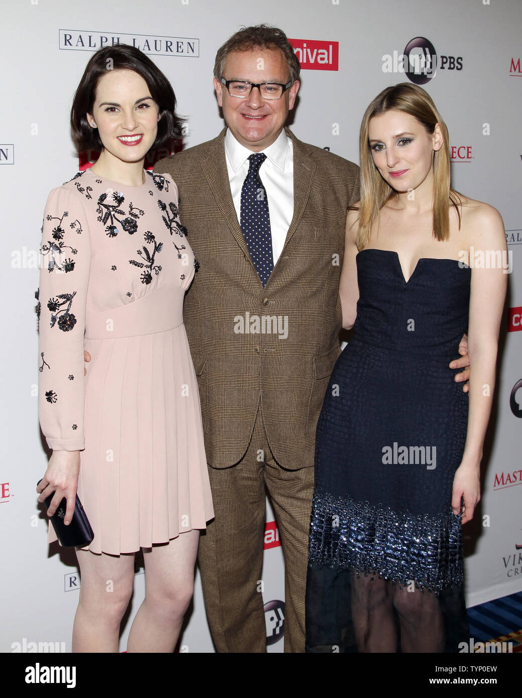 Laura Carmichael, Michelle Dockery and Hugh Bonneville arrive on the red  carpet at the 'Downton Abbey' Season Four cast photo call at Millenium  Hotel in New York City on December 10, 2013.