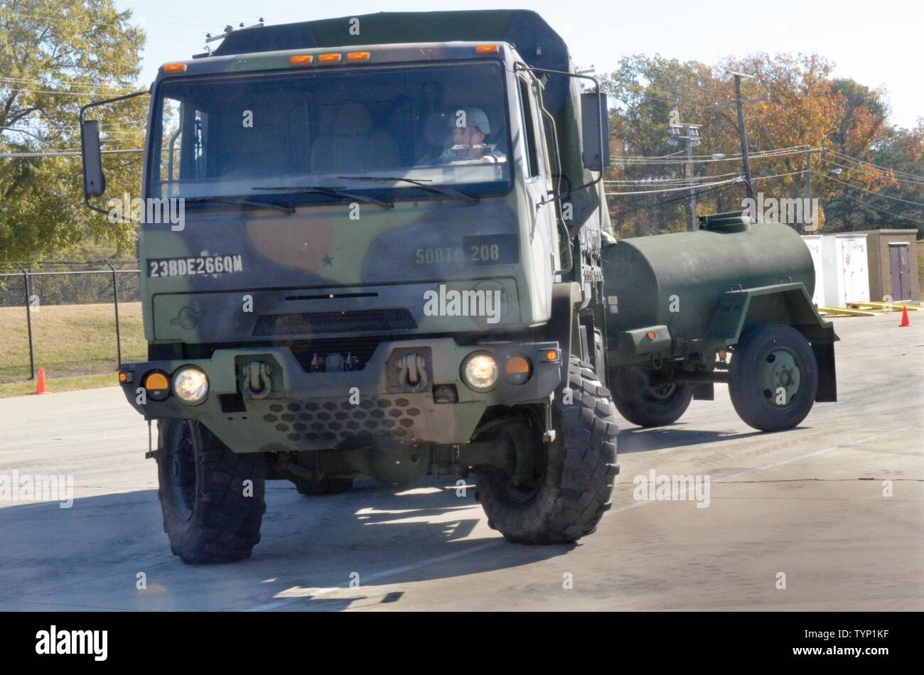 A competitor wheels a Light Medium Tactical Vehicle with an M149 water trailer through the course Nov. 18 during the annual 508th Transportation Company Truck Rodeo that took place in the unit’s motor pool complex. Stock Photo