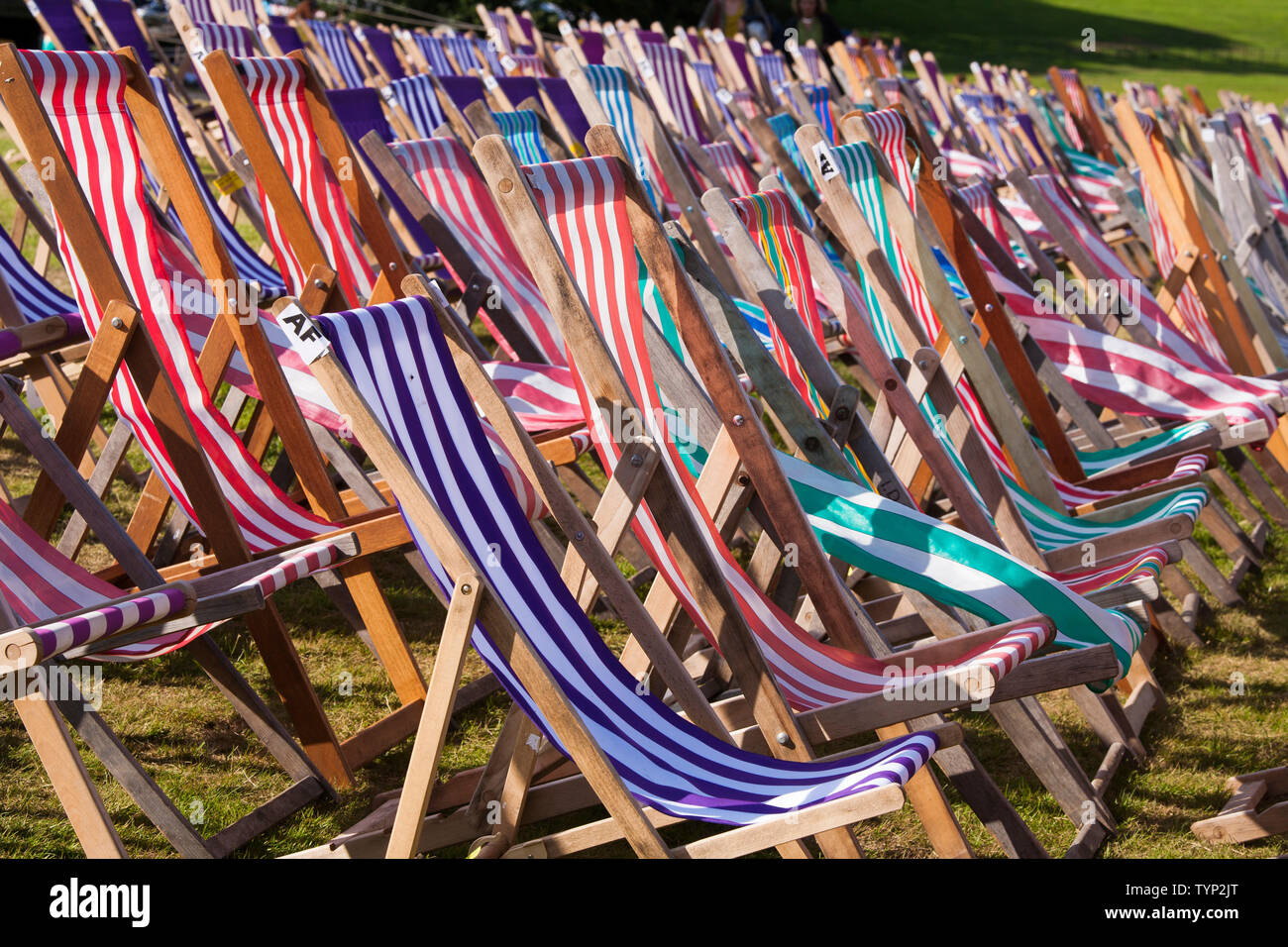 Traditional Wooden Deckchairs Set Out In Rows Uk Stock Photo Alamy traditional-wooden-deckchairs-set-out-in-rows-uk-stock-photo-alamy