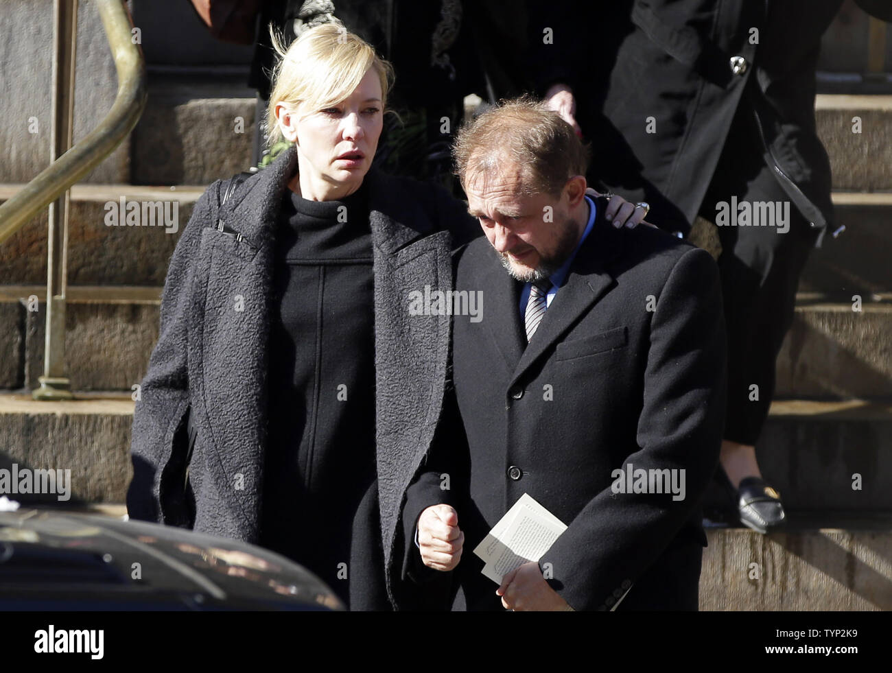 Cate Blanchett and Andrew Upton exit the funeral of Philip Seymour Hoffman at St. Ignatius Church on Manhattan's Upper East Side in New York City on February 7, 2014. Hoffman, 46, was found dead Sunday of an apparent heroin overdose in his apartment. He leaves behind his partner of 15 years, Mimi O'Donnell, and their three children.     UPI/John Angelillo Stock Photo