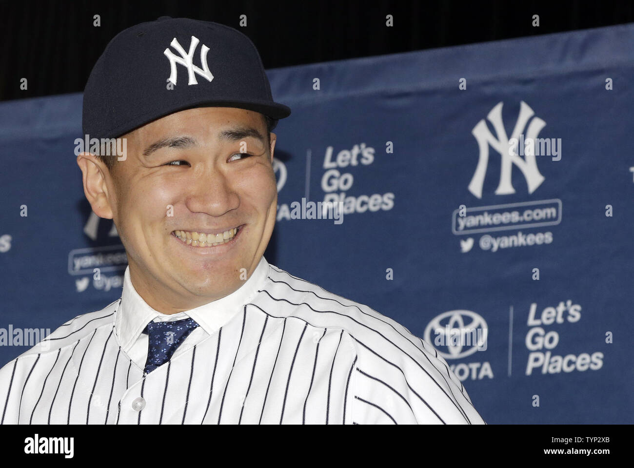 New York Yankees Masahiro Tanaka speaks to the media in his new