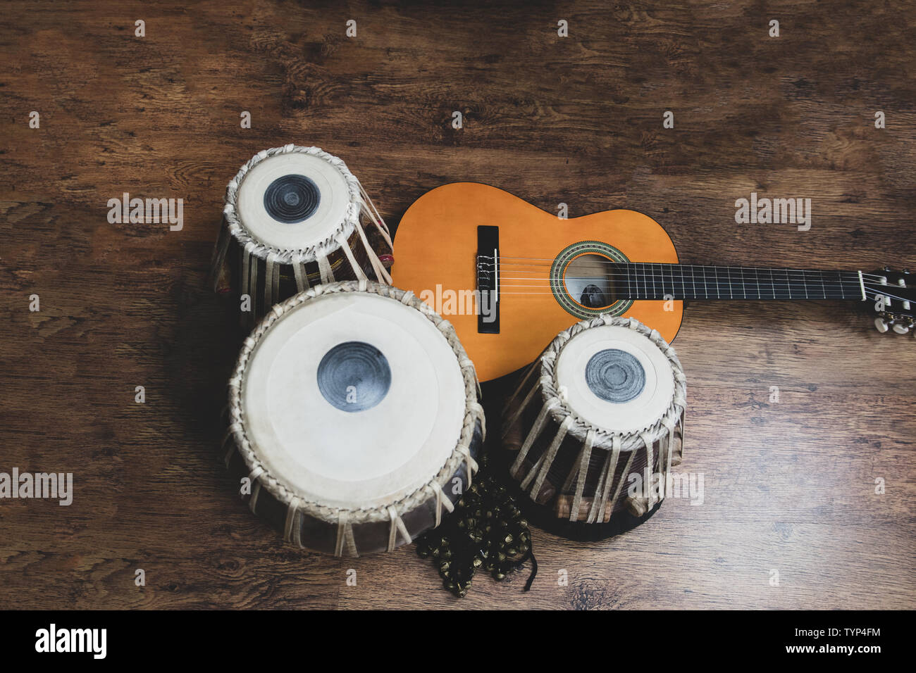 Acoustic guitar, cajon and tabla - view of the musical instruments used for  fusion eastern and western music, and also jazz and blues Stock Photo -  Alamy