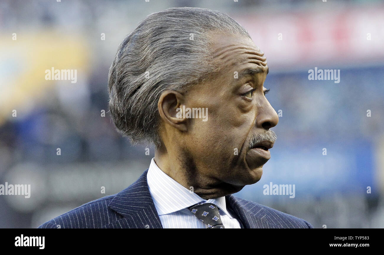 Rev. Al Sharpton stands on the field after a plaque is unveiled in Monument Park honoring the late South African President Nelson Mandela on Jackie Robinson Day in game 2 of a double header against the Chicago Cubs at Yankee Stadium in New York City on April 16, 2014. UPI/John Angelillo Stock Photo