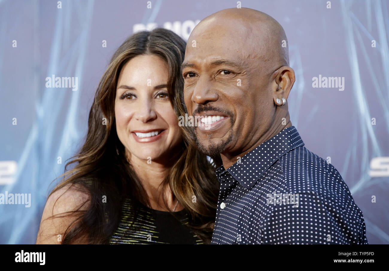 Montel Williams and Tara Fowler arrive on the red carpet at The Amazing Spider-Man 2 premiere at the Ziegfeld Theater in New York City on April 24, 2014.           UPI/John Angelillo Stock Photo