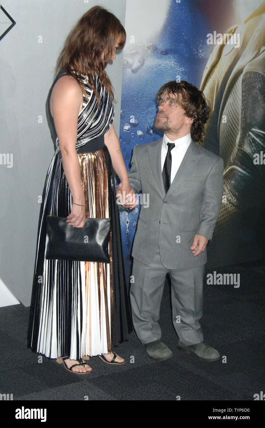 Peter Dinklage and Erica Schmidt arrive on the red carpet at the X-Men: Days Of Future Past World Premiere at Jacob Javits Center in New York City on May 10, 2014.     UPI/Dennis Van Tine Stock Photo