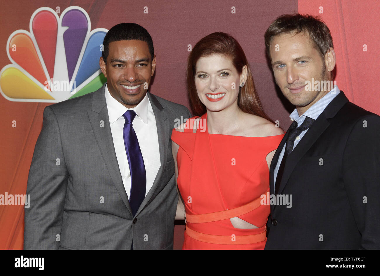 Josh Lucas and Debra Messing arrive on the red carpet at NBC's Upfront Presentation at the Jacob Javitz Center in New York City on May 12, 2014.      UPI/John Angelillo Stock Photo