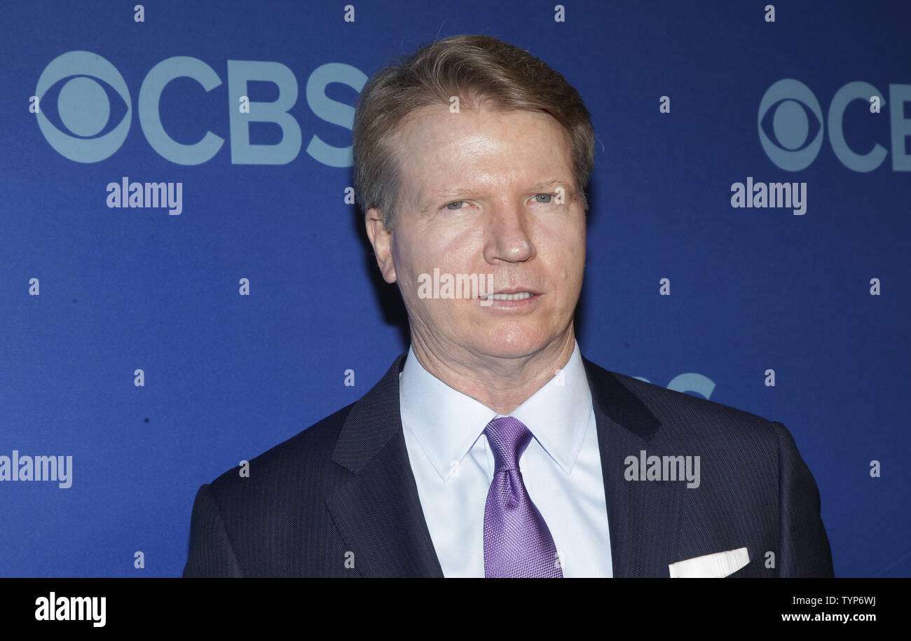 Phil Simms arrives on the red carpet at the CBS 2014 Upfront