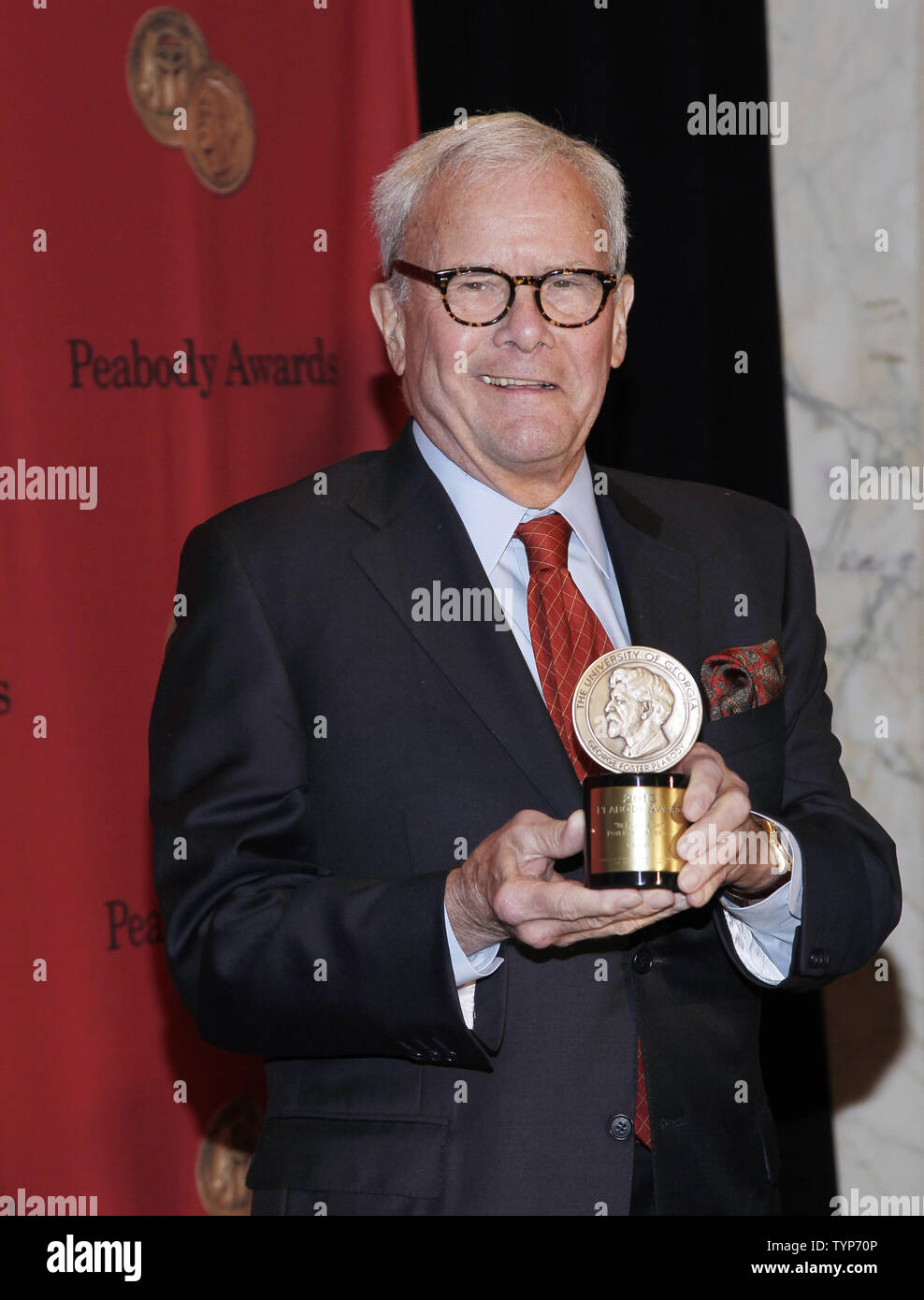 Tom Brokaw arrives on the red carpet at the 73rd Annual Peabody Awards