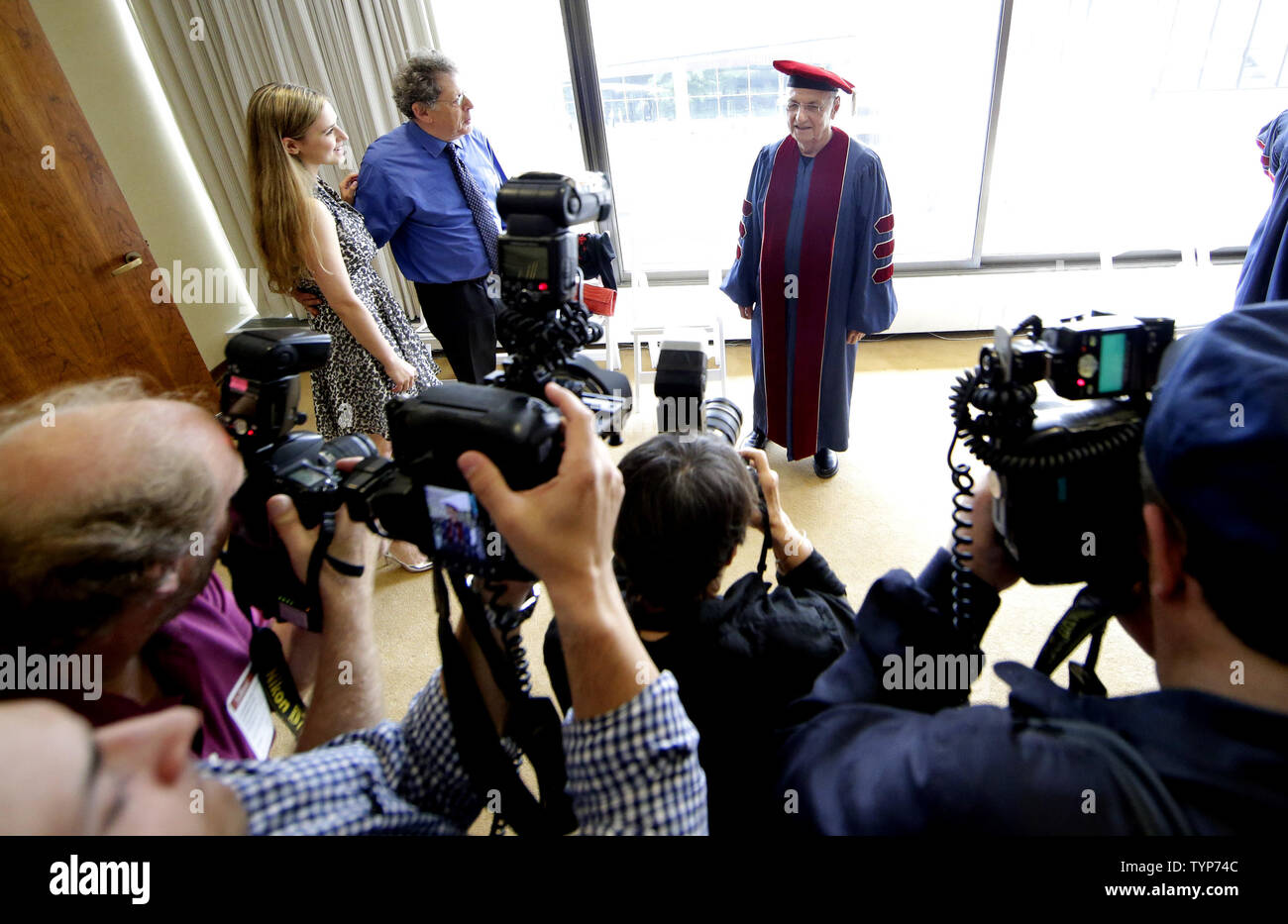 Frank Owen Gehry stands in a cap and gown before receiving an Honorary Doctor of Music degree at the Juilliard School 109th commencement ceremony at Alice Tully Hall in New York City on May 23, 2014.       UPI/John Angelillo Stock Photo