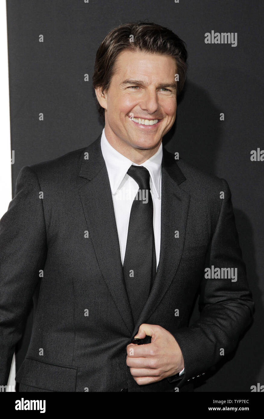 Tom Cruise arrives on the red carpet at the New York Fan Premiere of ...